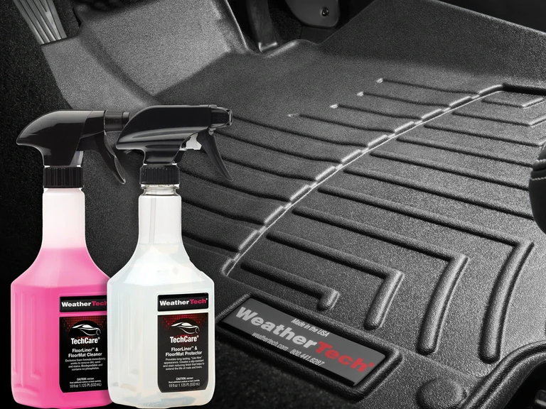 WeatherTech Cleaner and Protector kit showing two different 18 oz bottles with sprayers